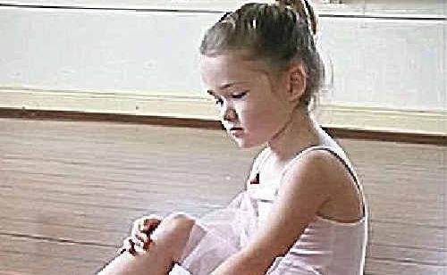 A young ballerina in attire from the Ballet Box. A young ballerina in attire from the Ballet Box.